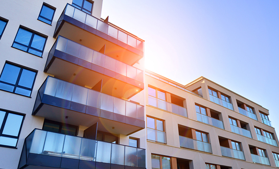 How are investment properties handled in property settlement?