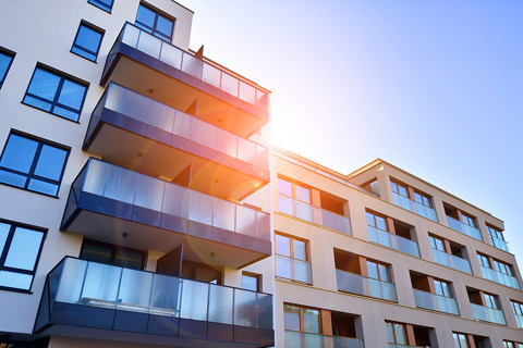 How are investment properties handled in property settlement?